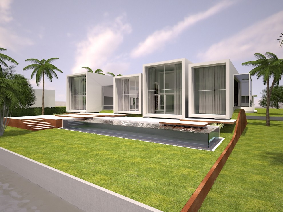 Ispirazione per la facciata di una casa grigia tropicale a due piani di medie dimensioni con rivestimento in cemento e tetto piano