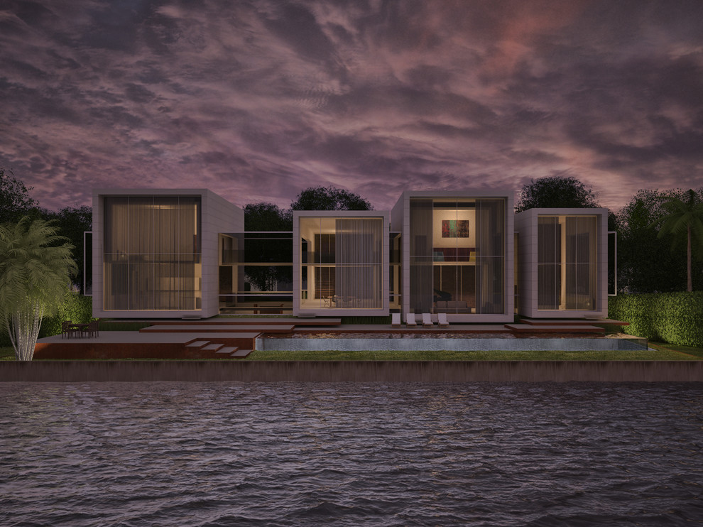 Идея дизайна: двухэтажный, белый дом среднего размера в современном стиле с облицовкой из бетона и плоской крышей
