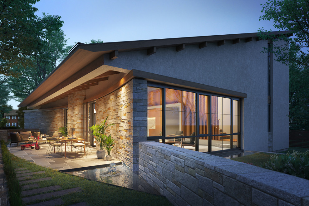 Inspiration pour une façade de maison beige design en stuc à un étage avec un toit en appentis et un toit en métal.