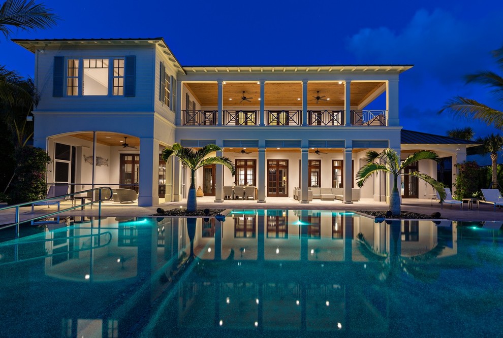 This is an example of a world-inspired two floor house exterior in Miami.