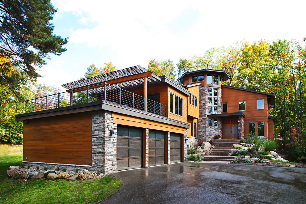 Contemporary house exterior in Detroit with wood cladding.