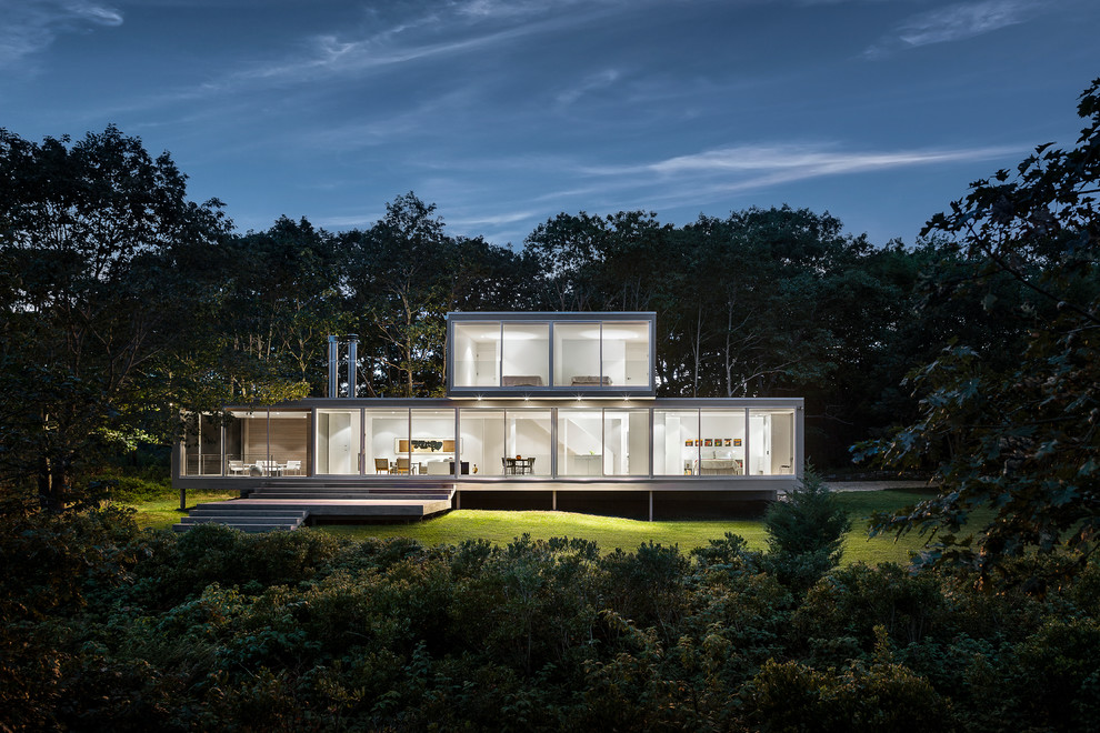 Contemporary two floor glass house exterior in Portland Maine.