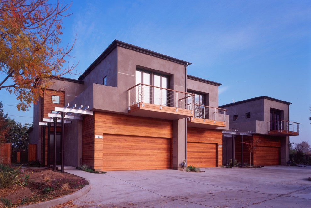 Photo of a contemporary semi-detached house in San Francisco with wood cladding.