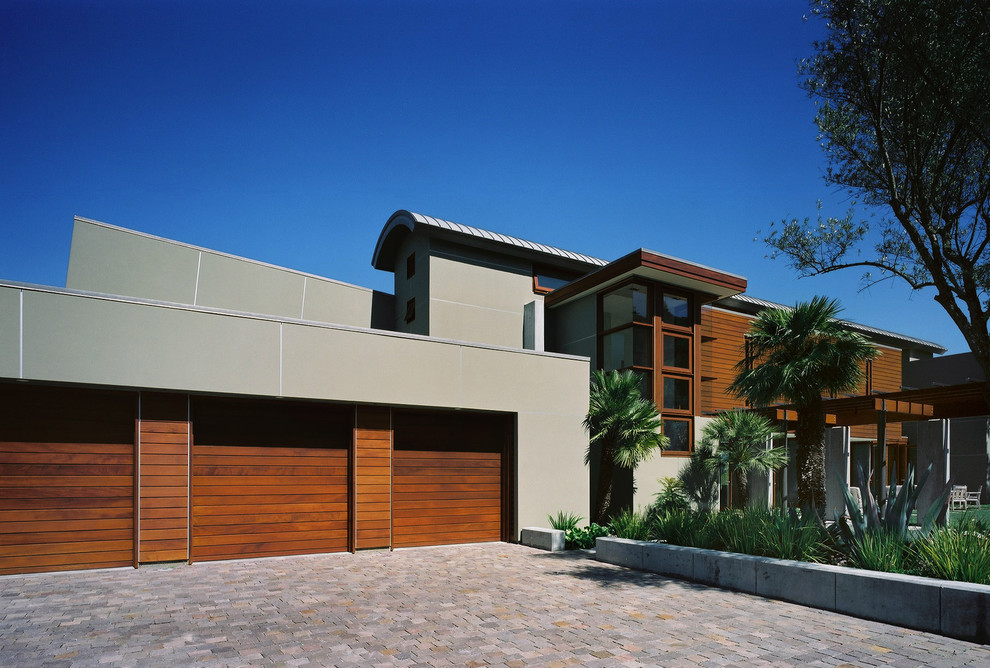 This is an example of a contemporary detached house in San Francisco with wood cladding.