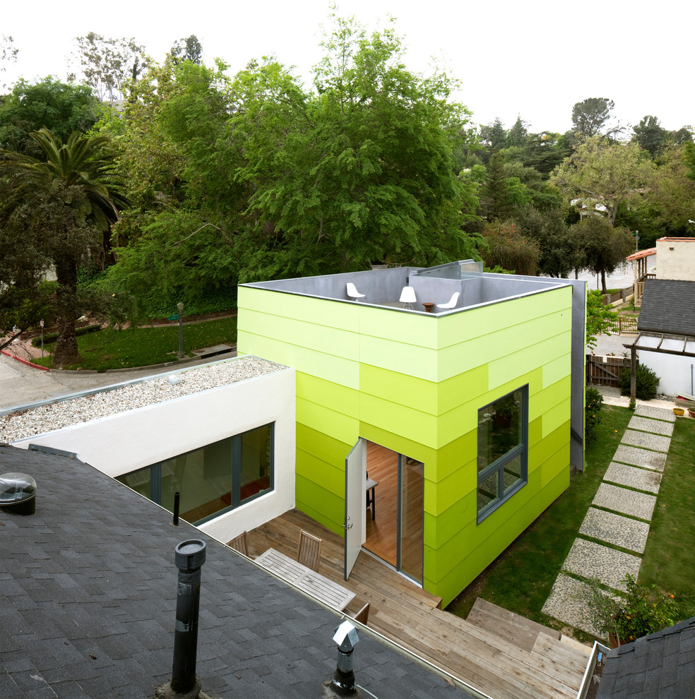 This is an example of a green contemporary house exterior in Los Angeles.