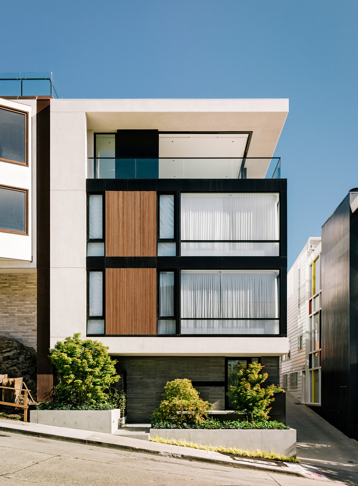 Photo of a contemporary house exterior in San Francisco with wood cladding.
