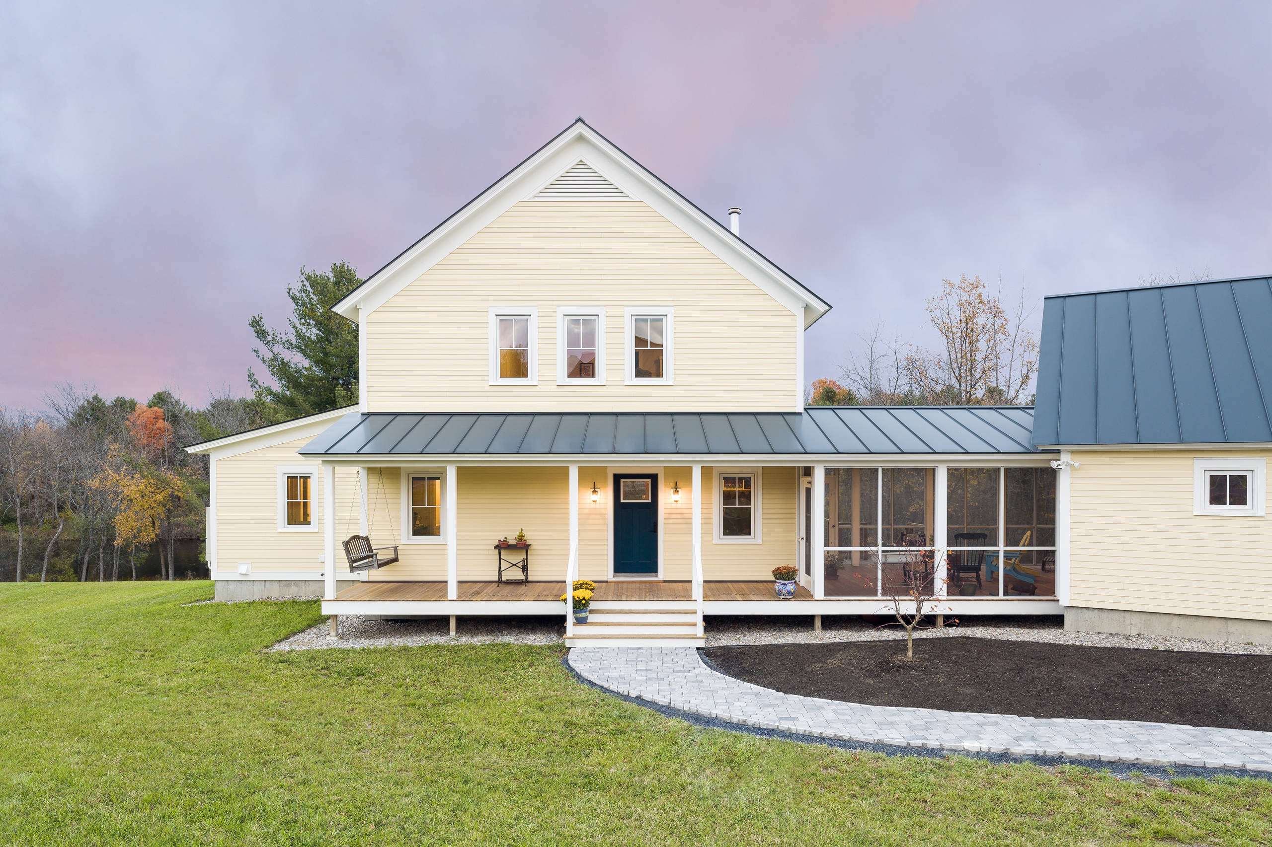 Modern Yellow Metal Roof Farmhouse