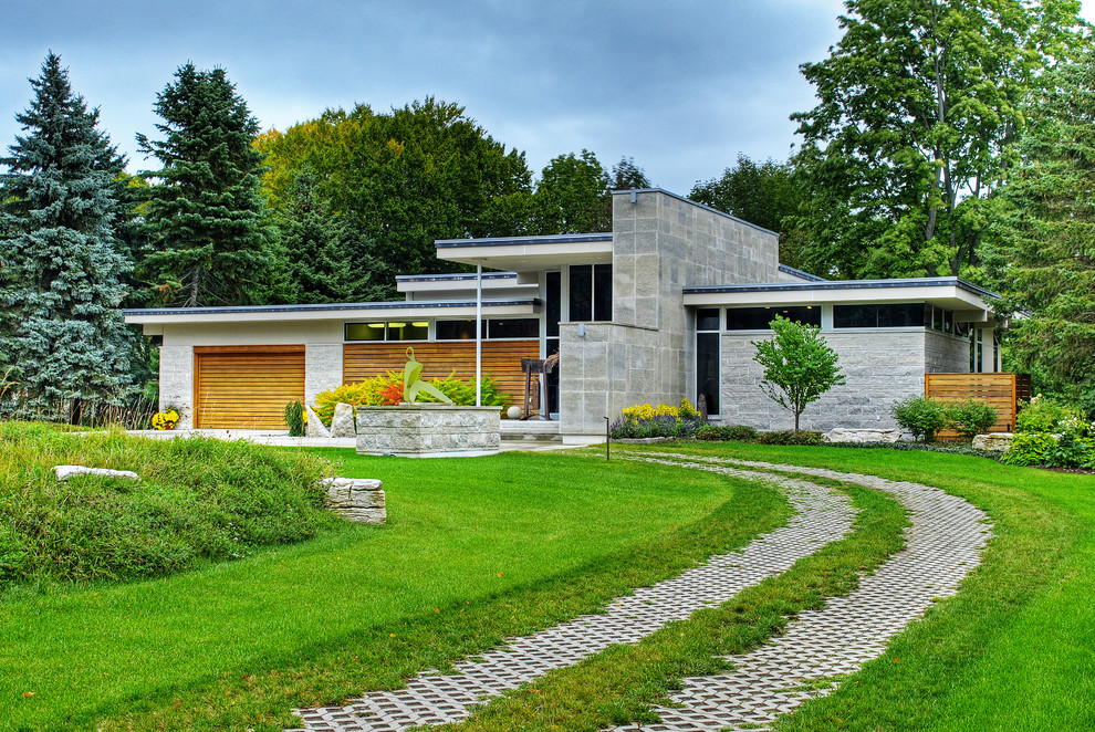 Contemporary house exterior in Toronto with stone cladding.