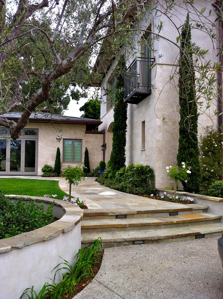 Example of a trendy stone exterior home design in San Diego
