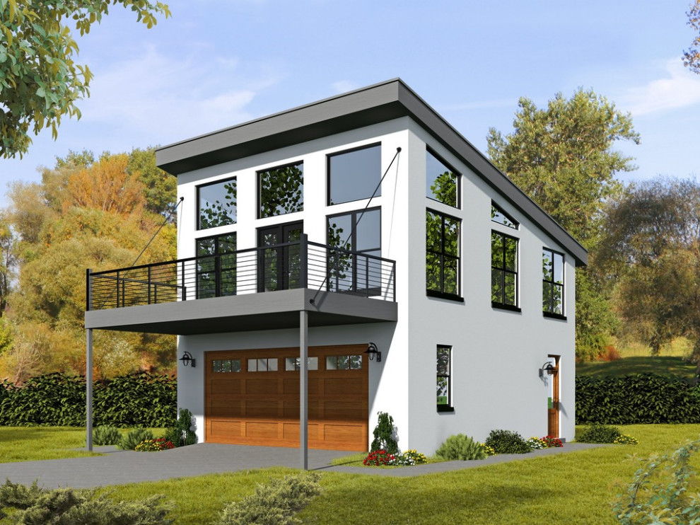 Immagine della facciata di una casa bianca contemporanea a due piani con rivestimento in cemento