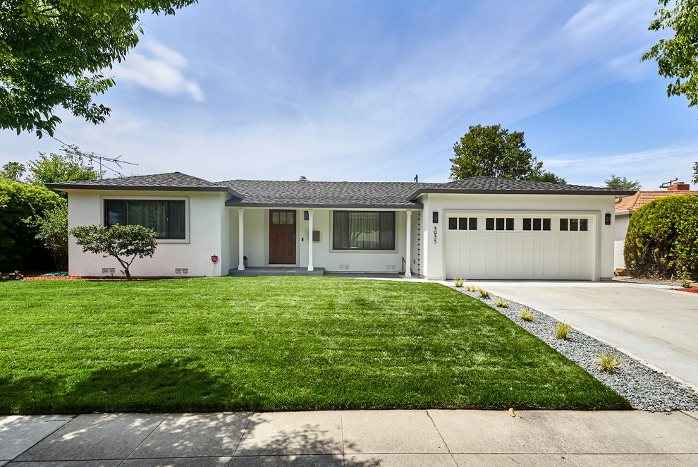 Inspiration for a mid-sized transitional white one-story stucco house exterior remodel in San Francisco with a hip roof and a shingle roof