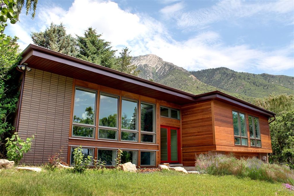 This is an example of a contemporary house exterior in Salt Lake City with wood cladding.