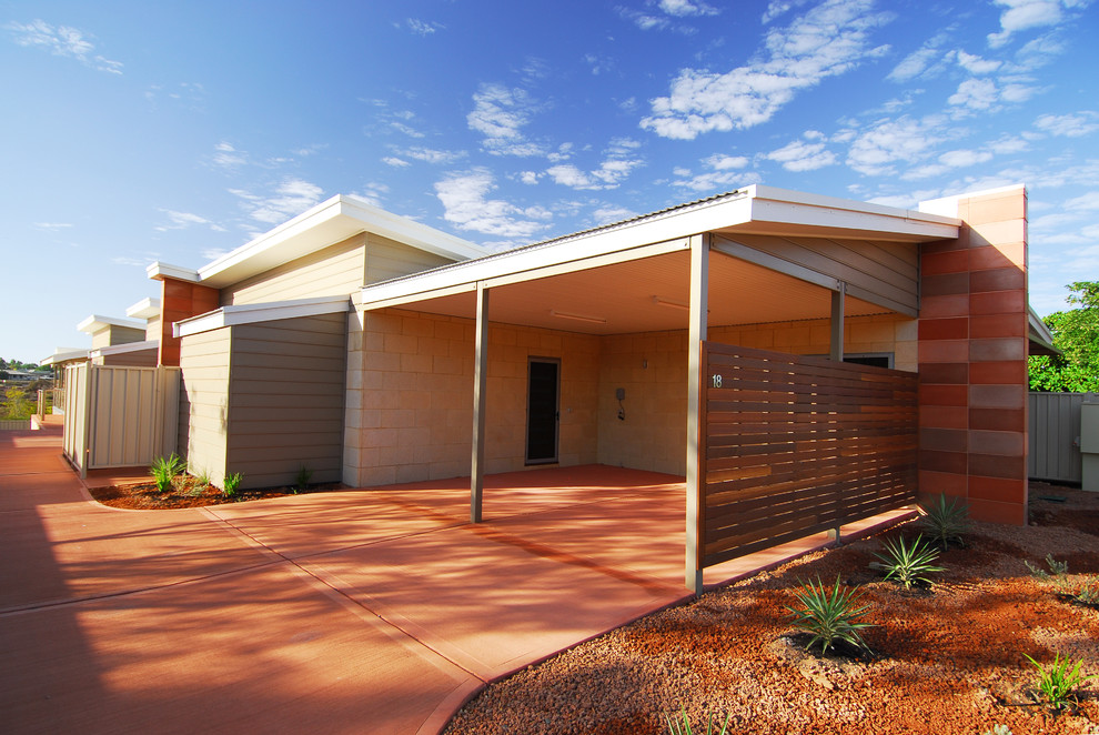 This is an example of a mid-sized contemporary two-storey concrete multi-coloured exterior in Perth with a flat roof.