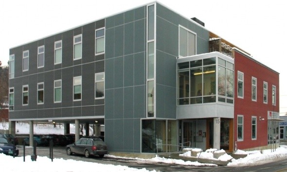 Example of a huge trendy gray two-story metal exterior home design in Burlington with a metal roof