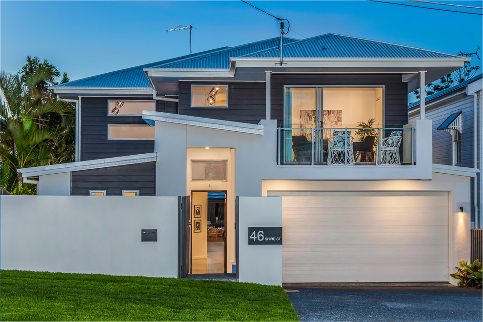 Trendy gray two-story wood house exterior photo in Brisbane with a hip roof and a metal roof
