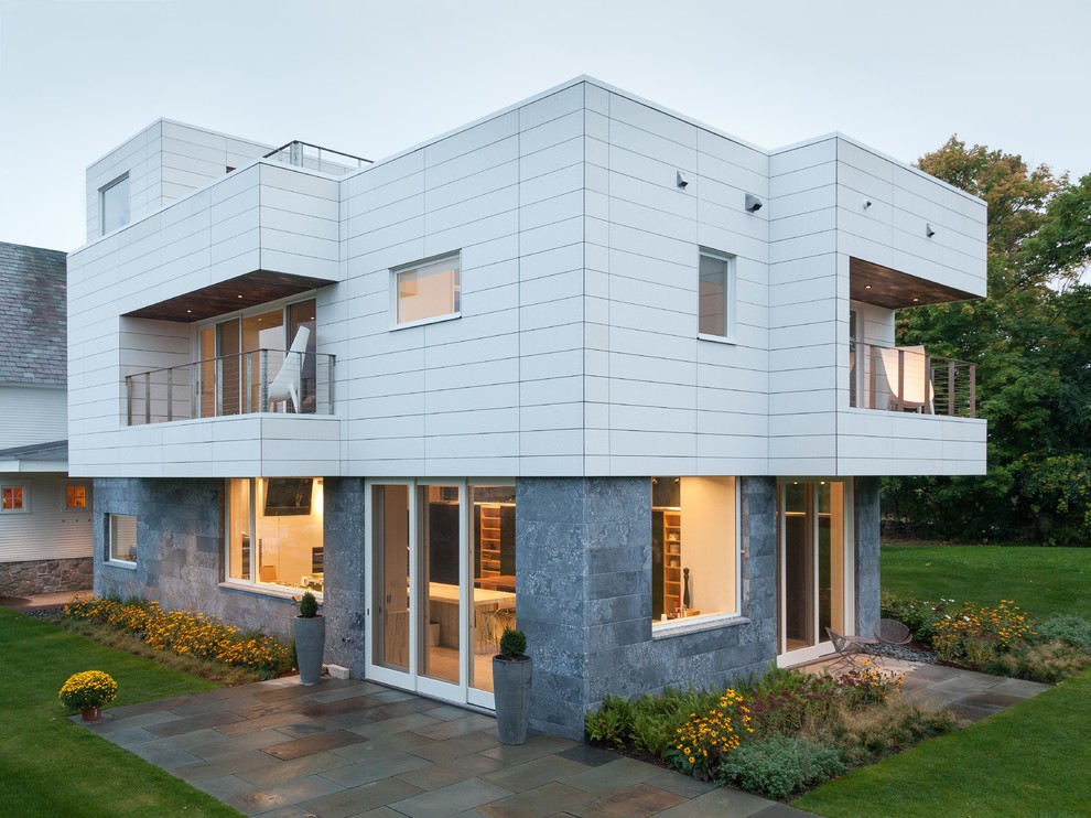 Contemporary white two-story mixed siding exterior home idea in Burlington
