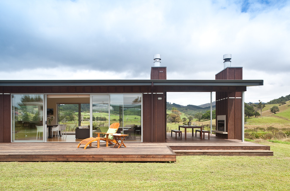 Diseño de fachada de casa moderna de una planta con tejado plano