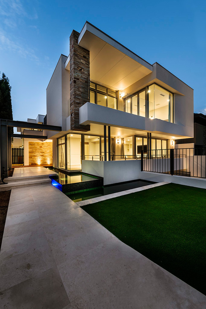 Inspiration for a large and white contemporary two floor house exterior in Perth.