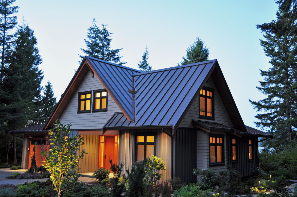 This is an example of a medium sized rustic house exterior in Vancouver.