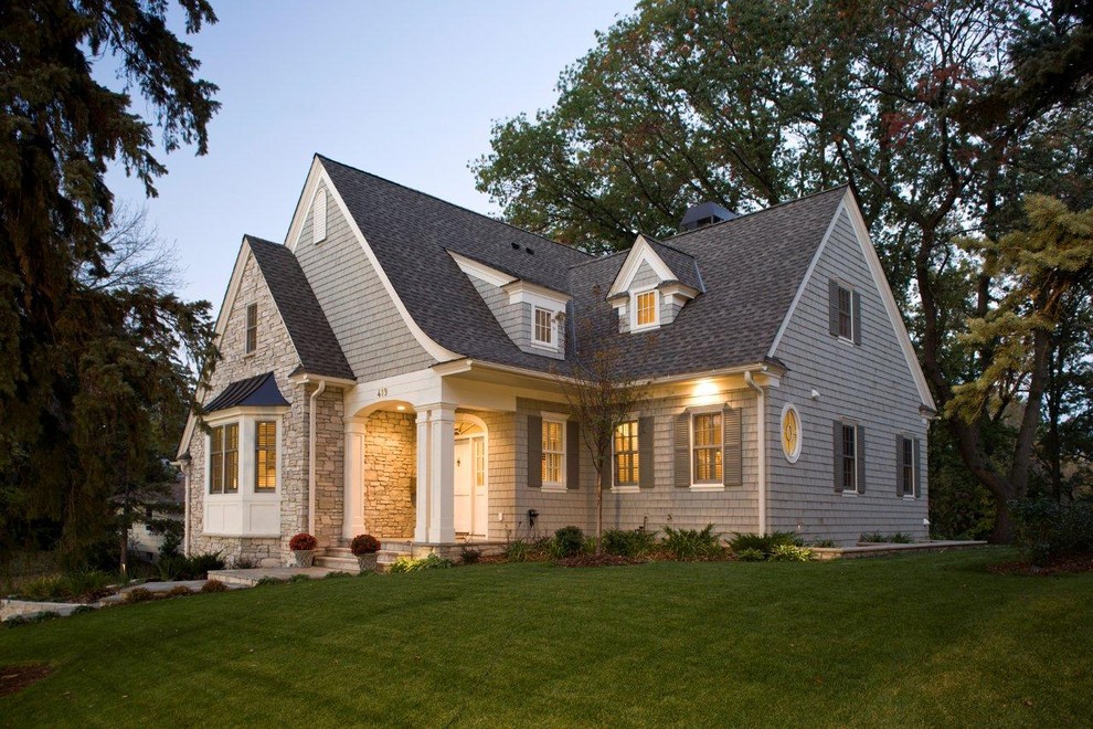 Traditional two-story wood exterior home idea in Minneapolis