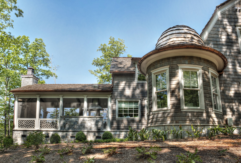 Inspiration for a mid-sized timeless gray two-story wood house exterior remodel in Other with a shingle roof