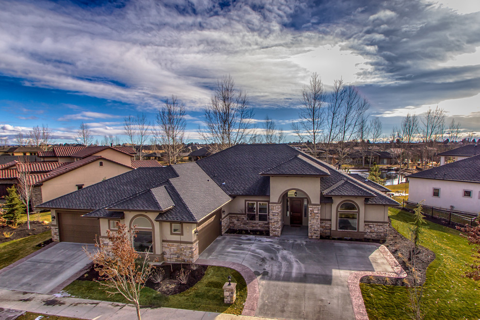 Example of a tuscan exterior home design in Boise