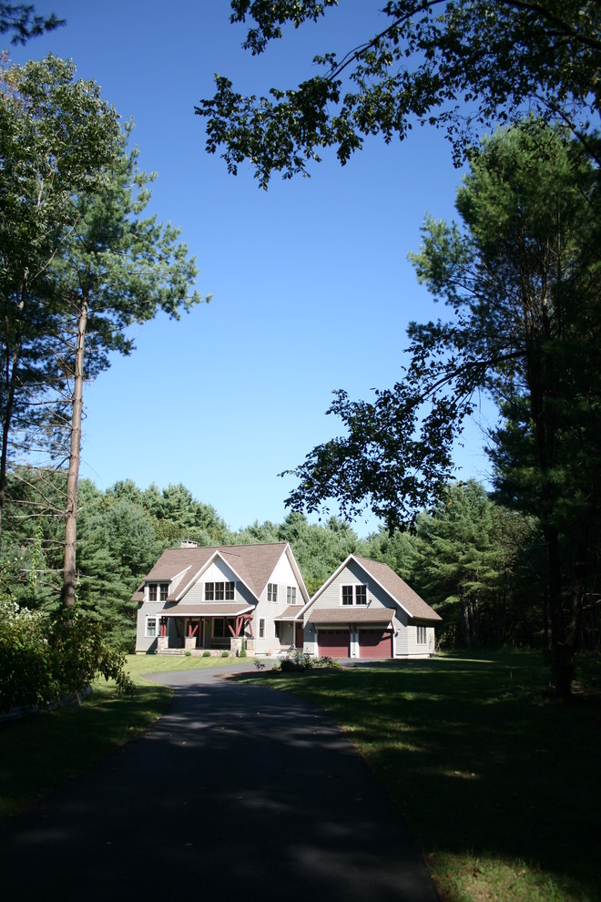 Example of a mid-sized arts and crafts gray two-story wood exterior home design in Boston