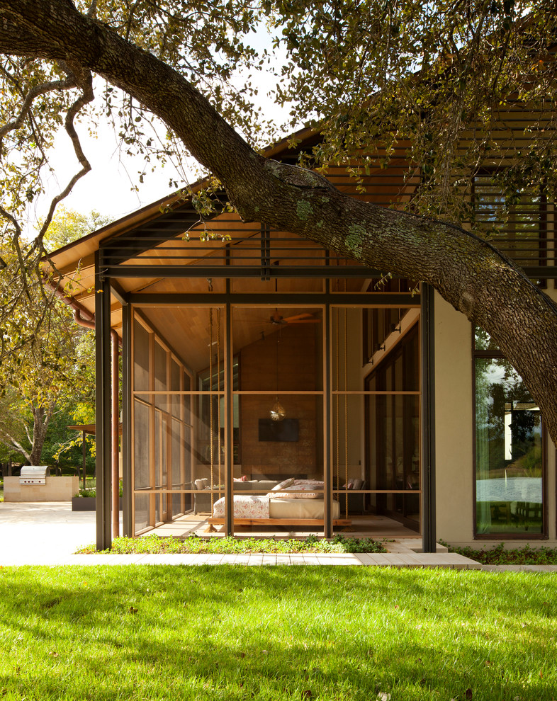 Inspiration for a contemporary house exterior in Austin with mixed cladding.