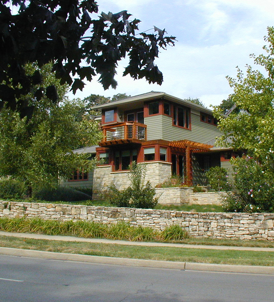Пример оригинального дизайна: двухэтажный дом в современном стиле с облицовкой из ЦСП