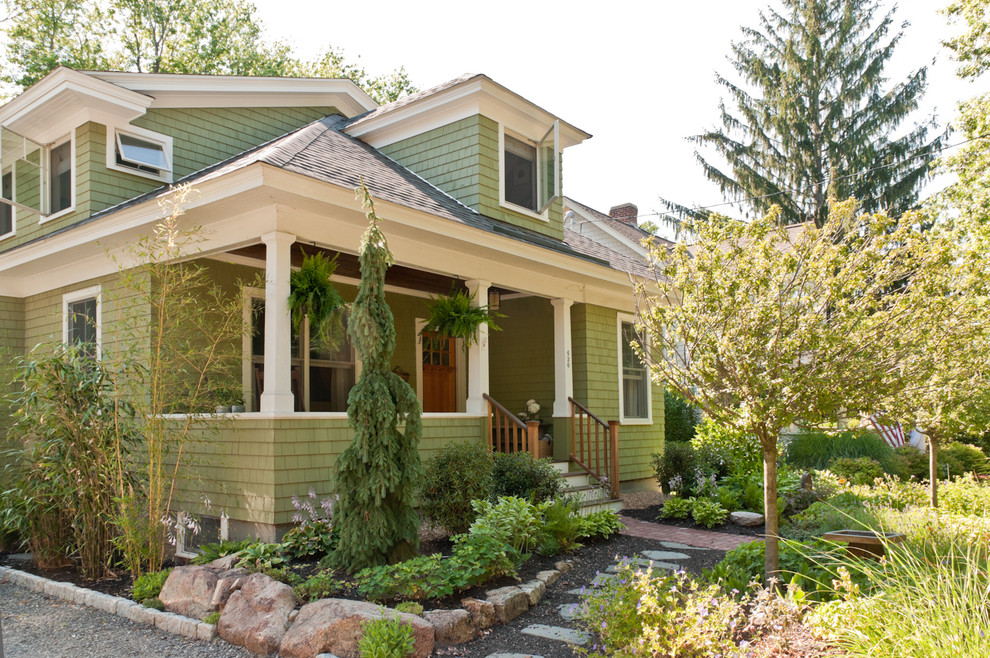 Craftsman green exterior home idea in Boston