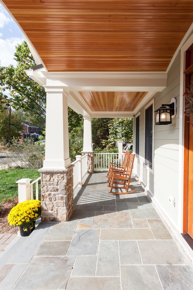 Inspiration for a craftsman green three-story mixed siding house exterior remodel in DC Metro with a shingle roof