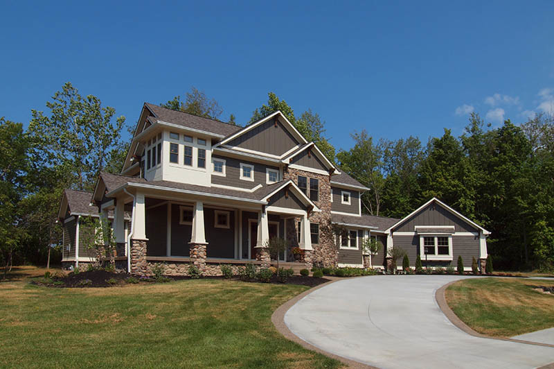 Inspiration for a large craftsman brown two-story mixed siding exterior home remodel in Indianapolis with a shingle roof