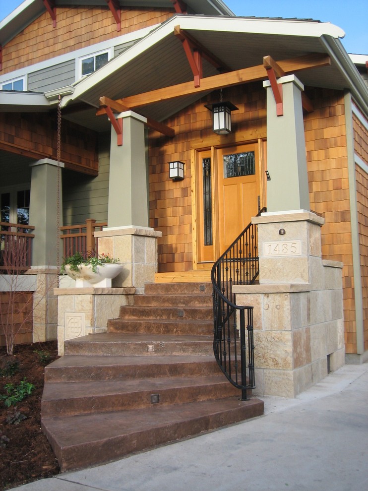 Inspiration for a craftsman wood exterior home remodel in Denver