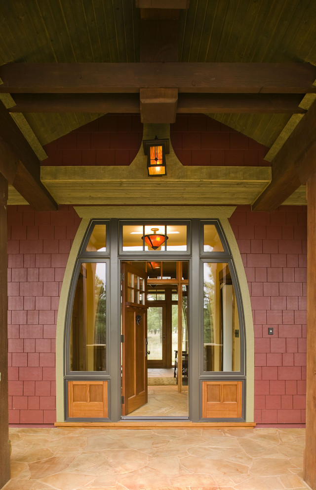 Example of an arts and crafts exterior home design in Phoenix