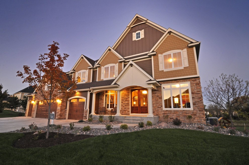 Example of a large arts and crafts two-story exterior home design in Minneapolis