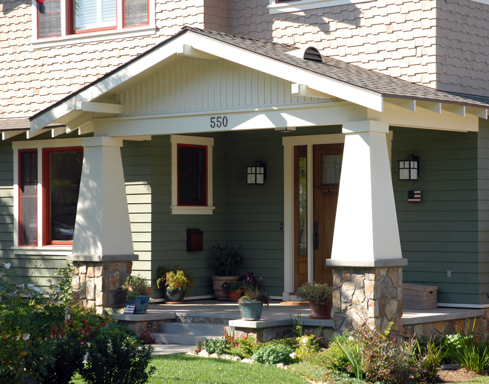 Inspiration for a large craftsman two-story wood exterior home remodel in San Diego