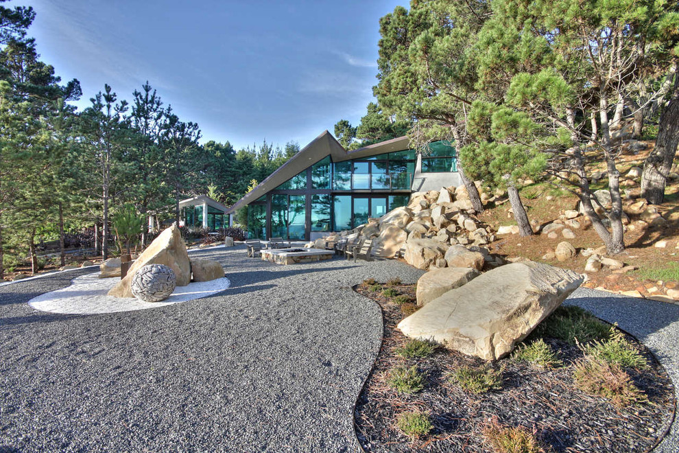 Trendy glass exterior home photo in Cincinnati