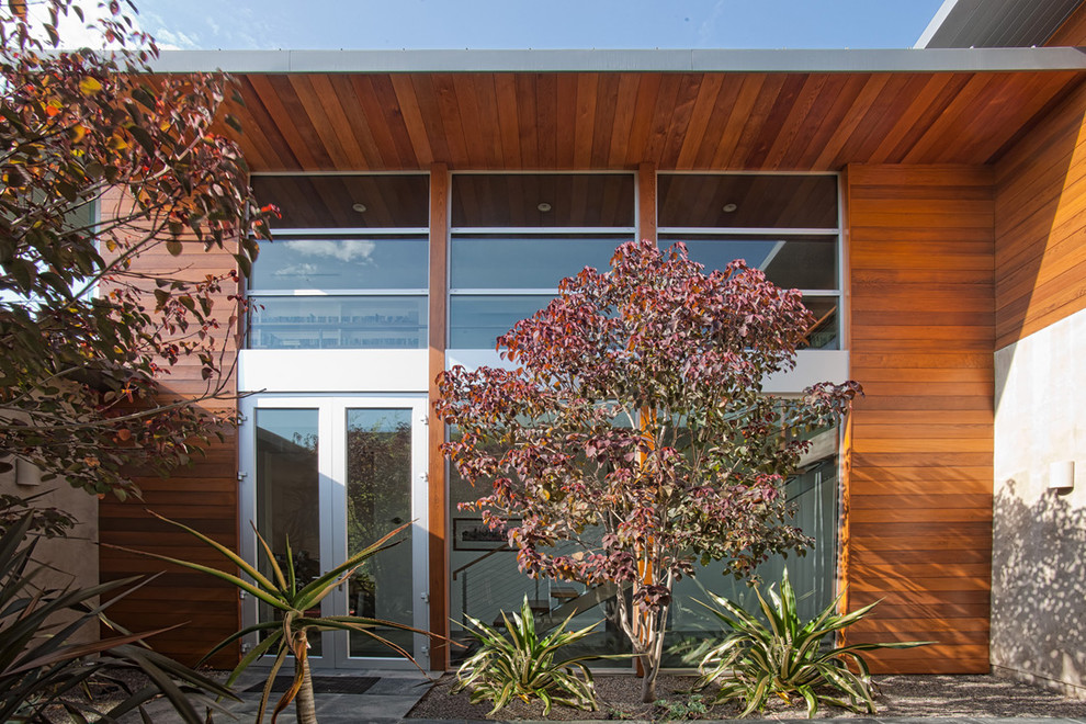 Minimalist wood exterior home photo in San Diego