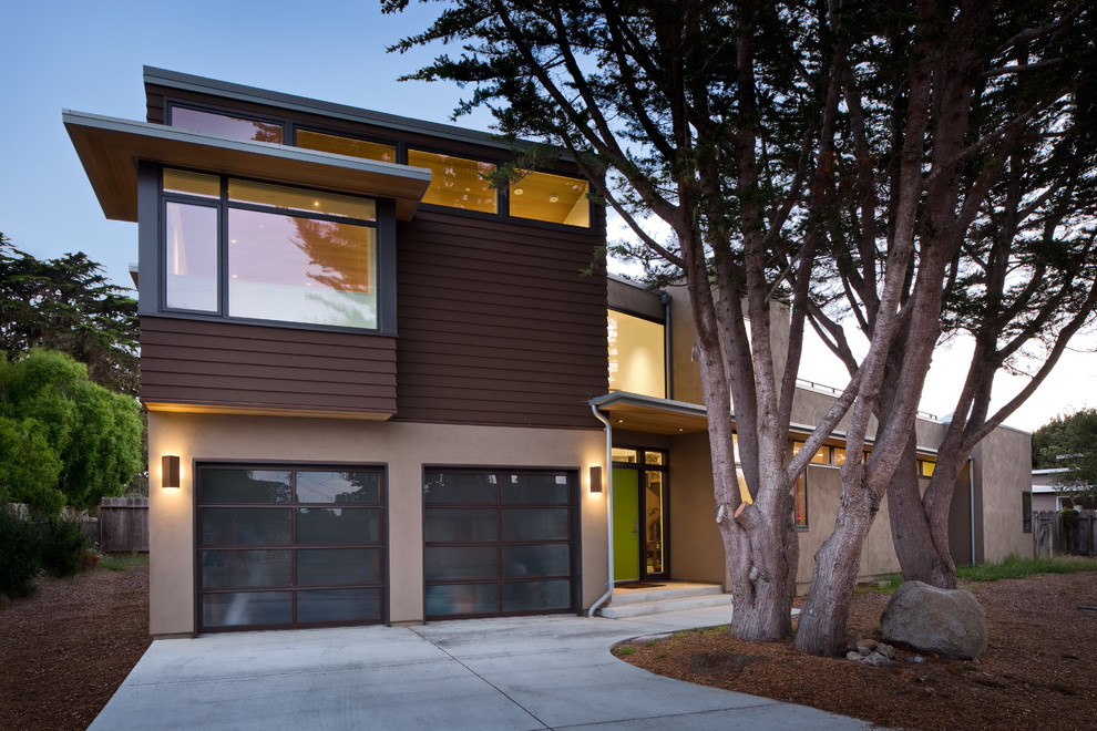 Photo of a medium sized and brown modern two floor house exterior in San Francisco with concrete fibreboard cladding.
