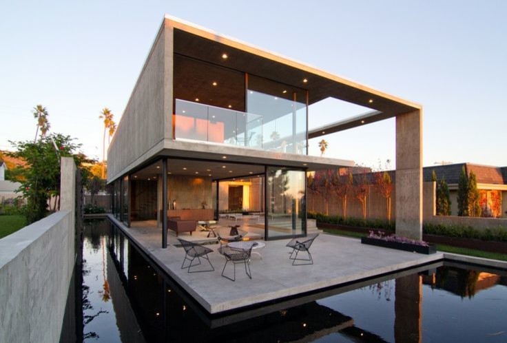 Modelo de fachada de casa gris minimalista de dos plantas con revestimiento de hormigón y tejado plano