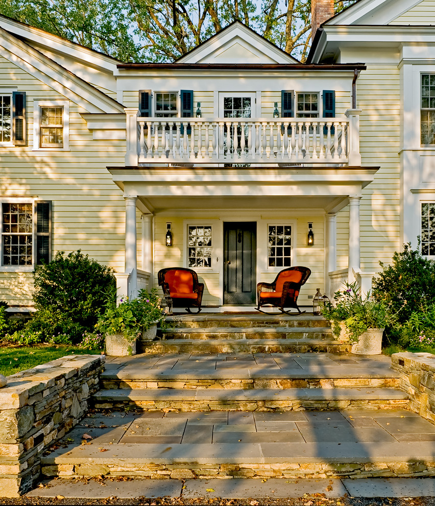 Inspiration for a timeless wood exterior home remodel in New York
