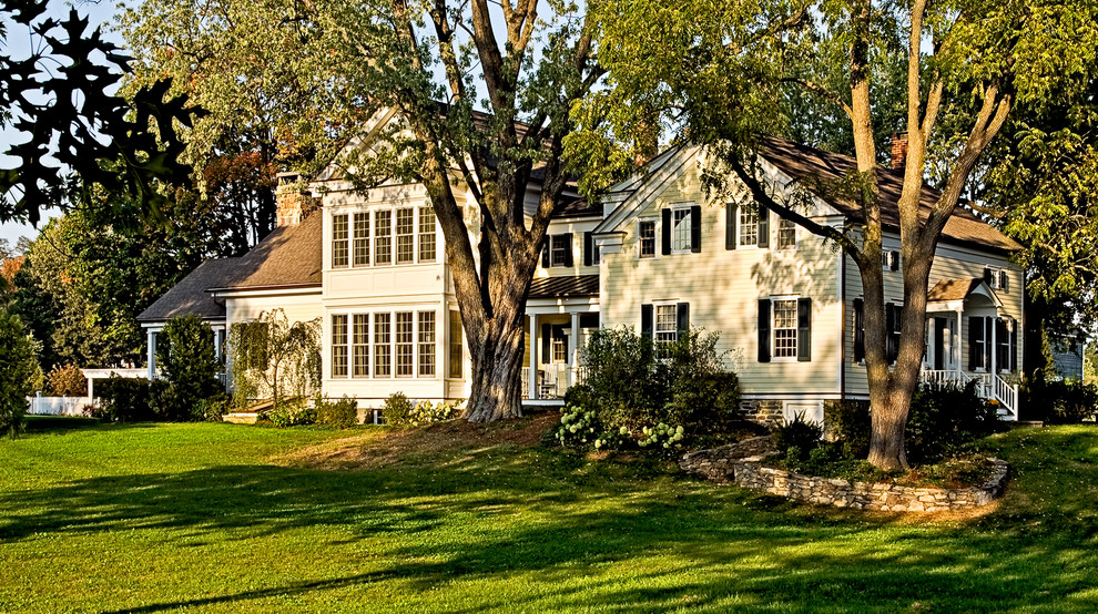 Classic house exterior in New York with wood cladding.