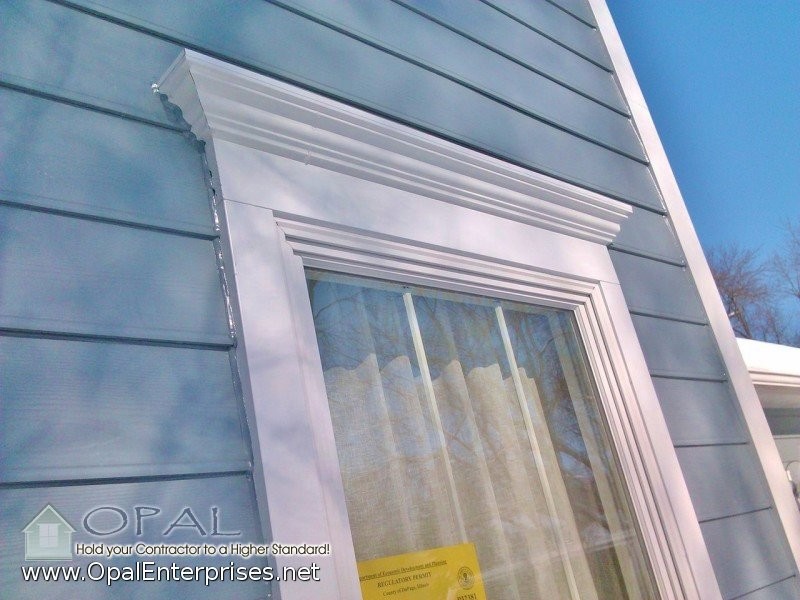 Crown Moldings in Cobble Stone by James Hardie, & Boothbay Blue Siding