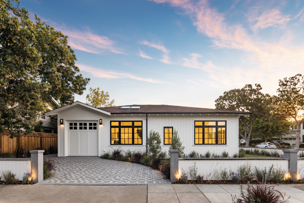 Inspiration for a medium sized and white contemporary bungalow detached house in San Francisco with wood cladding, a hip roof and a shingle roof.