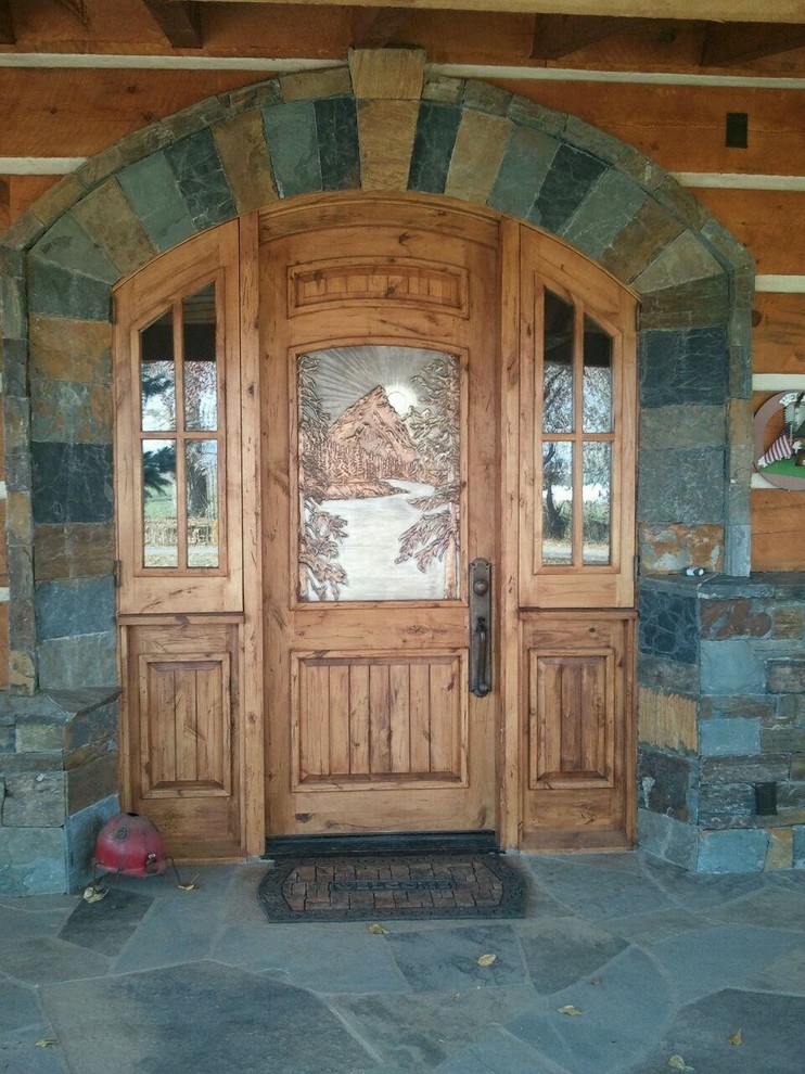Custom Ached Entry with Pine Mountain Scene Rustic Exterior Salt