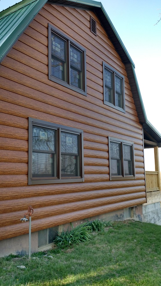Idéer för rustika bruna hus, med metallfasad
