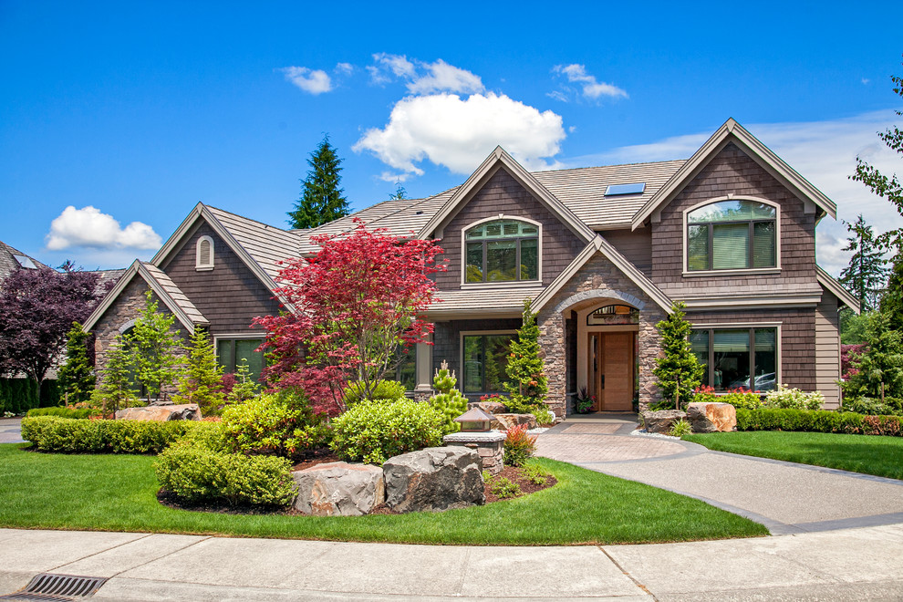 Inspiration for a classic house exterior in Seattle with wood cladding.