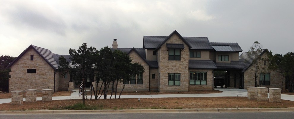 Example of a transitional two-story exterior home design in Austin
