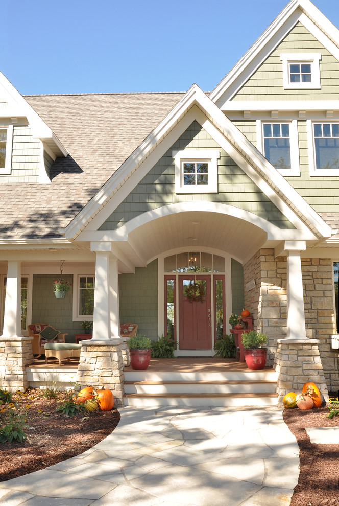Elegant green exterior home photo in Other