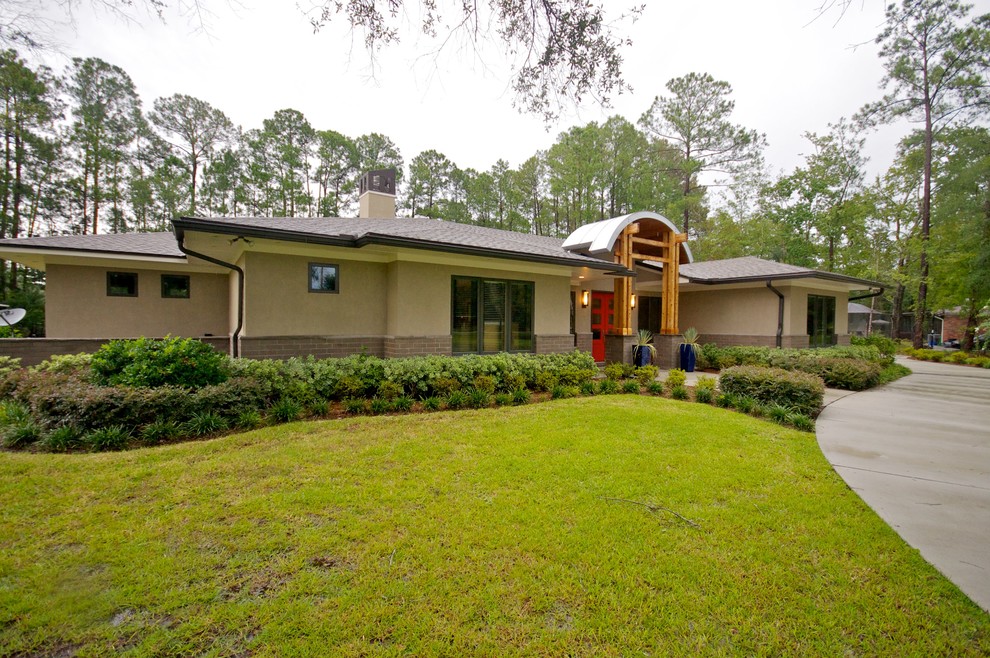 Custom home exterior Contemporary Exterior Jacksonville by EIS